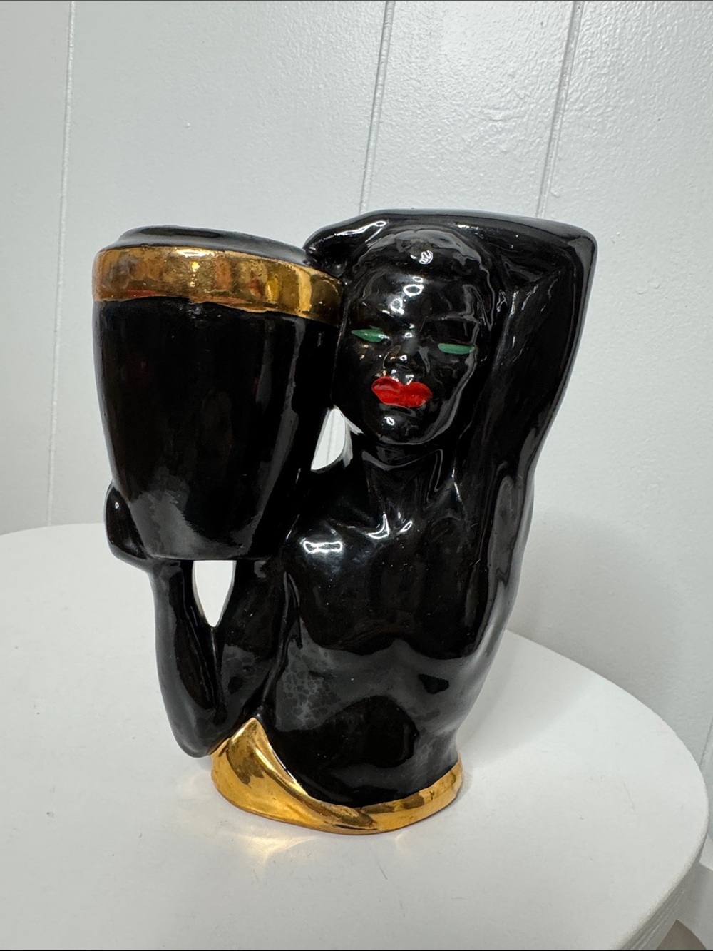 Vintage ceramic planter man holding vase